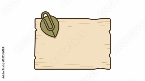 Wooden board with paper clip and leaf