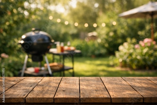 Summer backyard garden with wooden table and blurred barbecue grill, warm outdoor setting for picnic, cooking, and seasonal lifestyle themes

