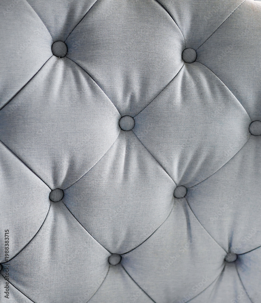Naklejka premium Light Blue Tufted Fabric Upholstery Texture with Buttons, Fabric textile material details