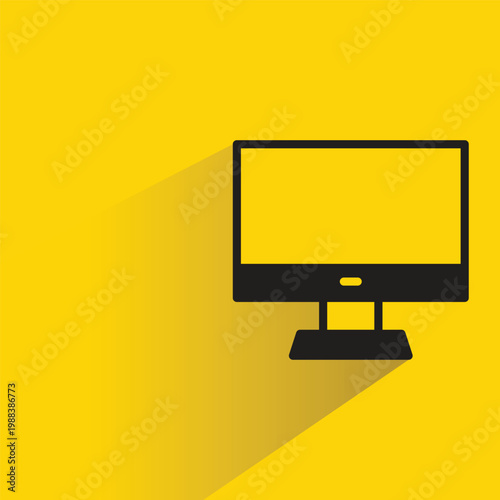 desktop computer icon with shadow on yellow background