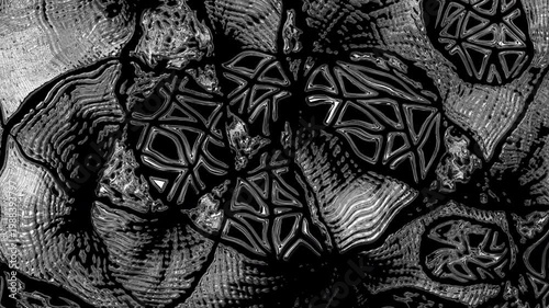 Abstract black and white liquid metal forming intricate patterns