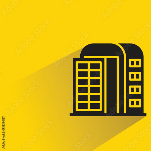 apartment and office tower icon with shadow on yellow background