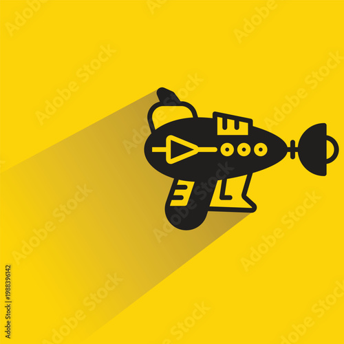 ray gun icon with shadow on yellow background