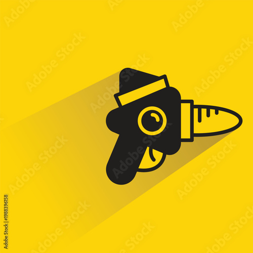 ray gun icon with shadow on yellow background