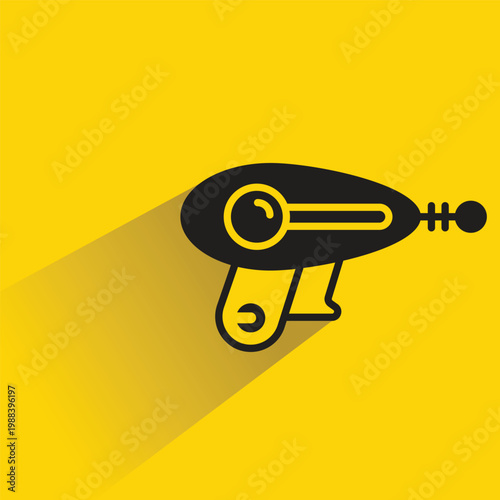 ray gun icon with shadow on yellow background