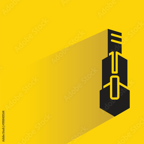 cutter knife icon with shadow on yellow background
