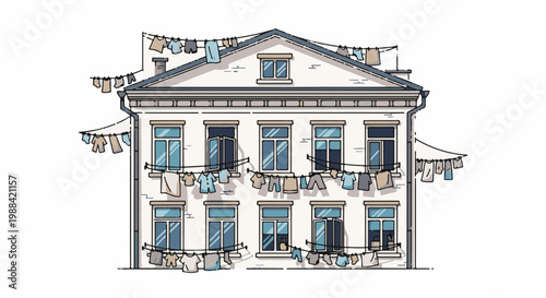 White apartment building with laundry hanging outside on clotheslines