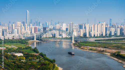 Cuadro en lienzo Aerial daytime view of Hankou CBD alongside Han River waterfront, Wuhan, Hubei,