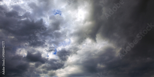 Dark big grey storm clouds. Dramatic sky.