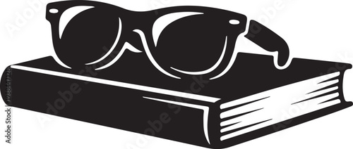 Clean black silhouette of sunglasses resting on beach book