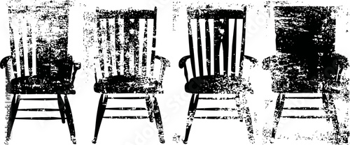 Four vintage wooden chairs with vertical slat backs, curved armrests, classic design