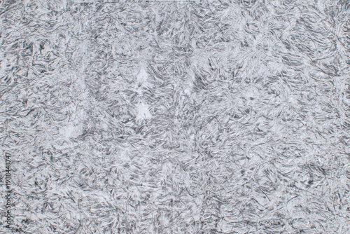 Closeup grey metallic surface with natural zinc crystal spangle abstract background.