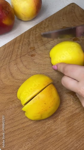 Cutting apple into four pieces