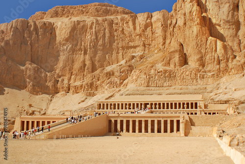 Photos Mortuary Temple of Queen Hatshepsut is located beneath the cliffs at Deir el Bahari on the west bank of the Nile near the Valley of the Kings in Egypt
