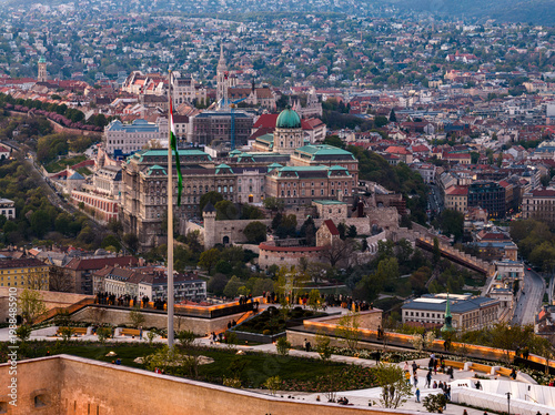 Renovated Liberty Statue, Szabadság Szobor, Citadella visitor center and Hungarian flag on Gellért Hill in Budapest, Hungary.