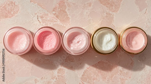 Pastel flat lay with skincare jars open, cream texture visible, soft lighting