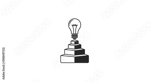 A lightbulb on stacked books inspiration.