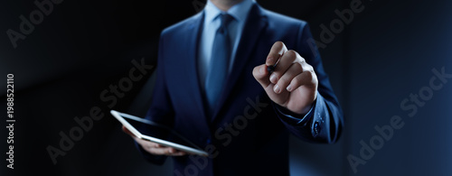 Businessman pressing button on virtual screen, Innovation and Digital Touch Interaction on Futuristic Technology Interface.
