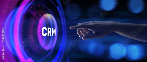 CRM Customer relationship management concept. Hand pressing button on screen.