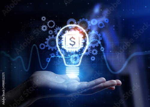 FinTech Financial Technology Transforming Financial Services and Innovation with Human Hand Holding Lamp Hologram.