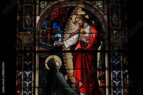 Tableau sur toile San Gioacchino in Prati Church Stained Glass Window Detail Depicting the Sacred Heart of Jesus and Saint Margaret Mary Alacoque in Rome, Italy