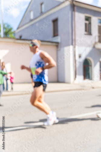 Wallpaper Mural Blurry action shot of a male runner in sportswear Torontodigital.ca