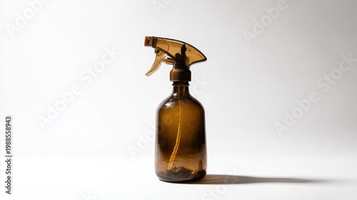Amber spray bottle isolated on white background for cleaning purpose