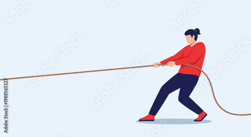 Determined woman engaging in a tug of war game, pulling with strength and focus to achieve her difficult goal.