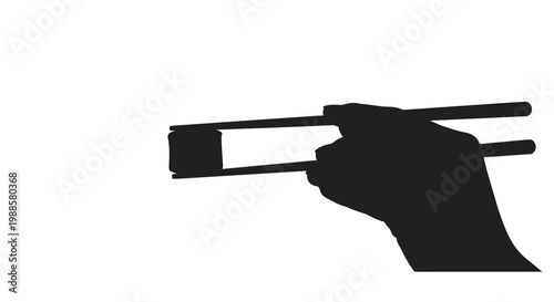 Silhouette of a hand holding chopsticks with a food item