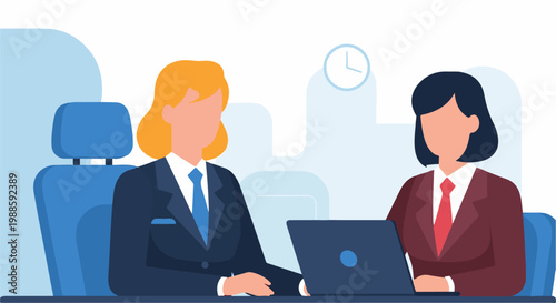 Two businesswomen in suits collaborate at a desk with a laptop and a clock on the wall