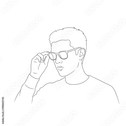 A young man wearing glasses and adjusting them thoughtfully