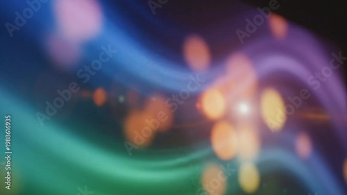 Abstract flowing blue and purple gradient with bokeh lights and subtle particle effects on a digital screen