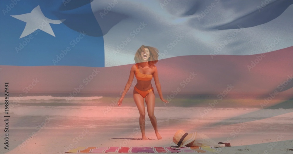 Fototapeta premium Shouting woman in orange bikini on beach, breeze lifting hair, blanket, celebrating flag overlay