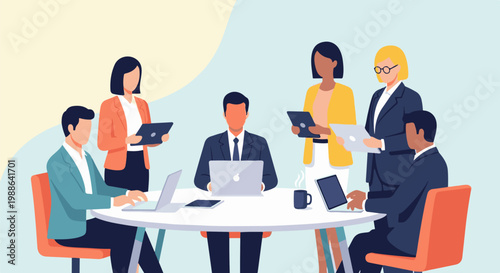 Diverse professionals collaborate around a table, using laptops and tablets in a modern meeting