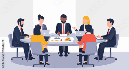 Diverse professionals collaborate around a conference table with laptops and charts