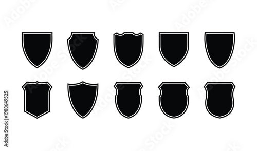 Collection of various black shield icons on for protection and security concepts