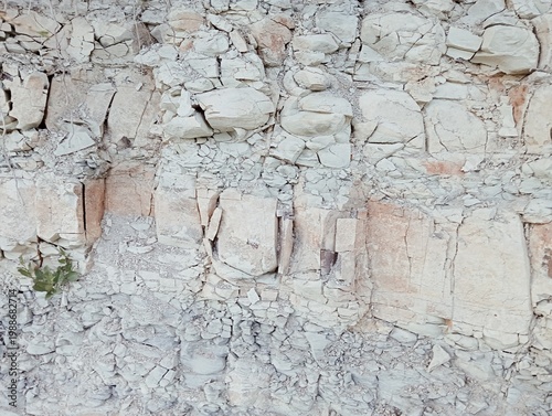  Natural texture of fractured white marl and sedimentary limestone rock.