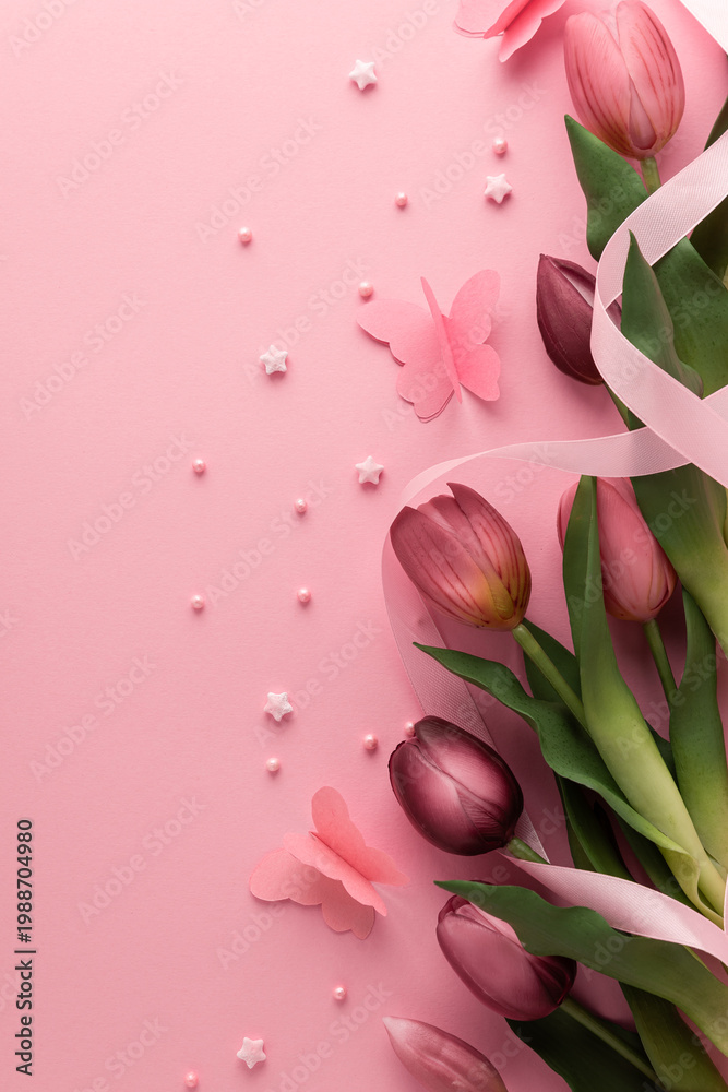 Naklejka premium Tulips with Ribbon and Paper Butterflies on Pink Background