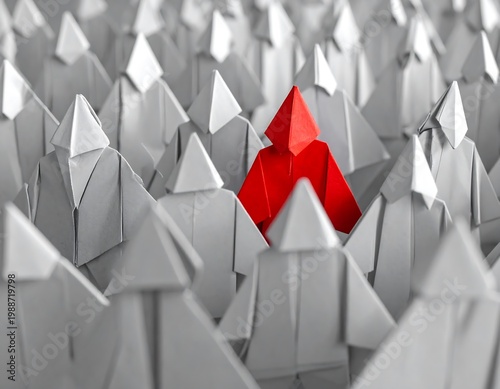 Red paper figure standing out from crowd.