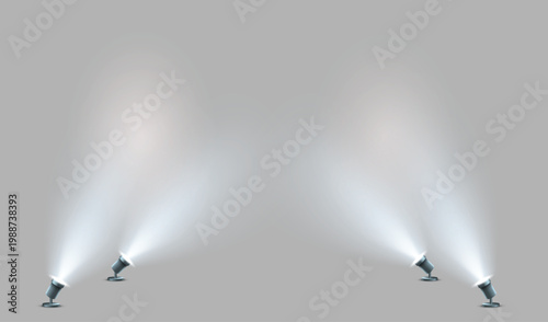 Bright floor spotlights illuminating an empty stage