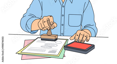 Man holding rubber stamp and pad.