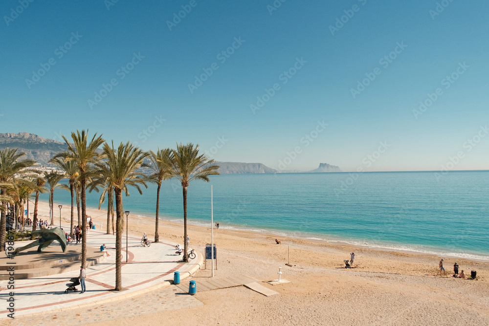 Fototapeta premium Albir beach and Mediterranean shore. Albir is stylish modern seaside resort of L' Alfas del Pi, Alicante province, Spain