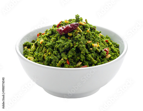 Chutney-like kale malai green couscous bowl with red chilies and crunchy vegetables