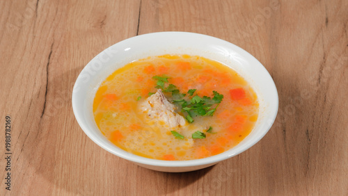 Chicken soup bowl on table isolated