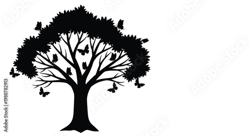 A silhouetted tree with numerous butterflies fluttering around its branches