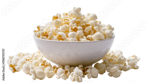 Картината върху платно Crispy popcorn spilling from a white bowl, isolated on transparent background