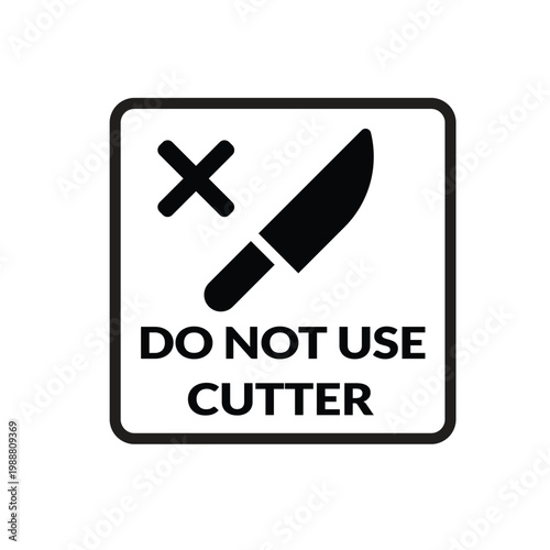 A warning sign featuring a cutter with a crossed out symbol indicates prohibition.