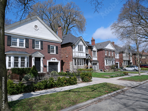 Wallpaper Mural Suburban residential street with traditional brick detached houses Torontodigital.ca