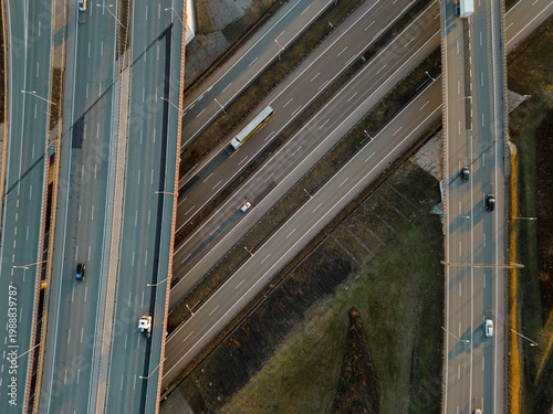 Canvastavla Top down aerial view of a complex highway interchange with multilevel overpasses