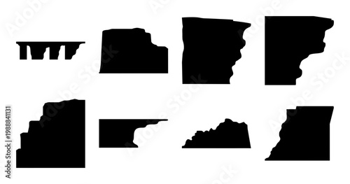 Variety of Black Silhouetted Cliffs and Rock Formations on a White Background